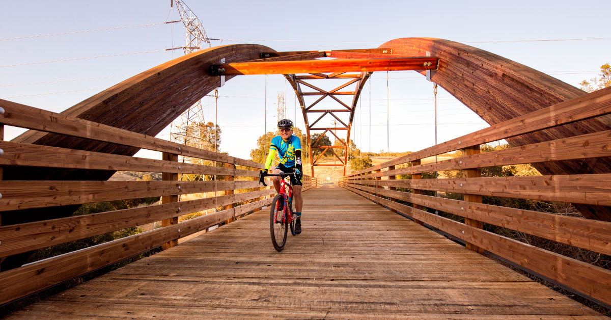 older man biking on the Johnny Cash Trail