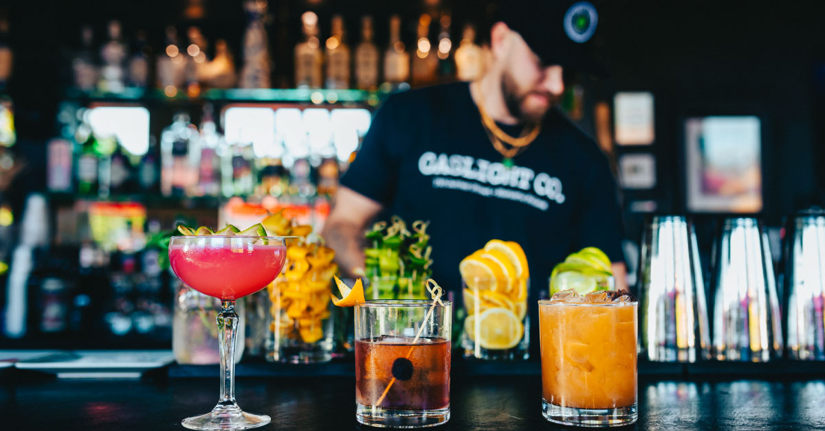 a row of cocktails