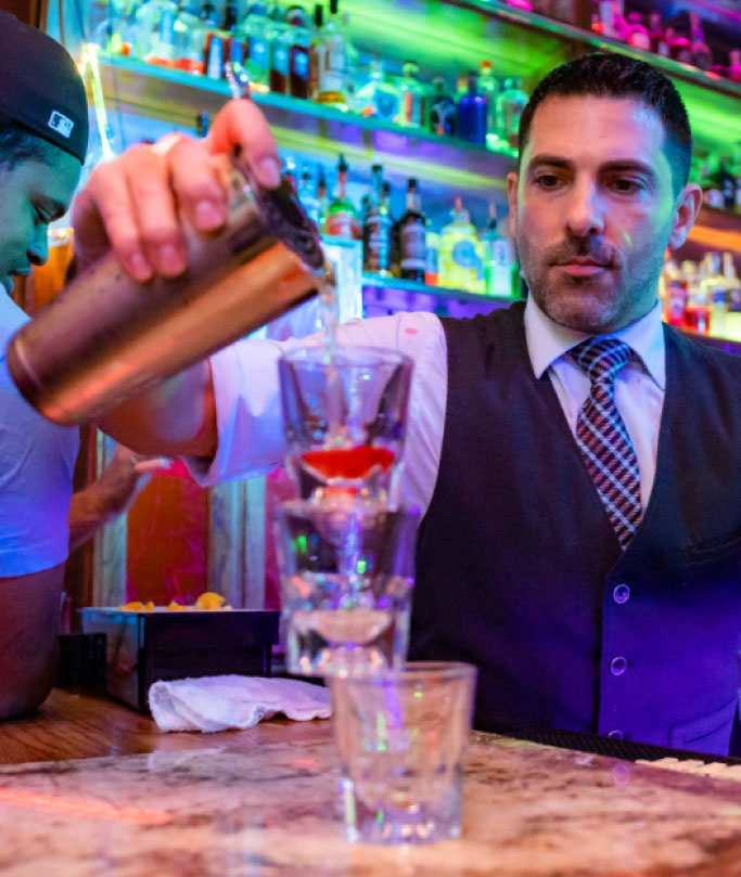 bartender pouring drinks
