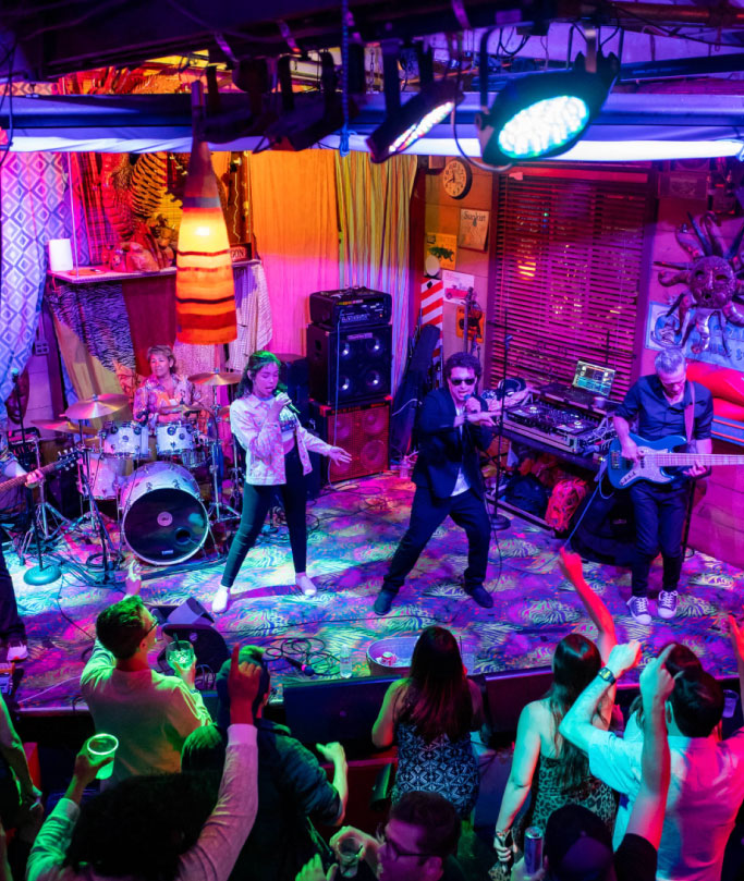 live band performing on stage at powerhouse pub