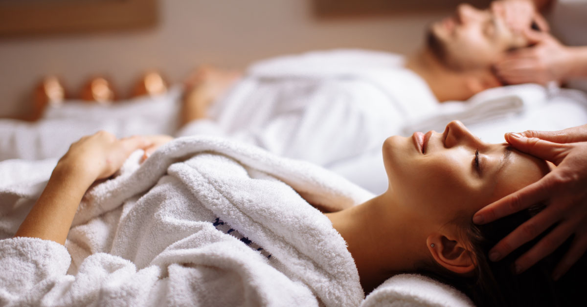 Man and woman getting a massage