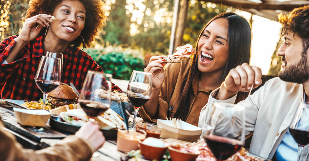 friends eating at an outdoor restaurant