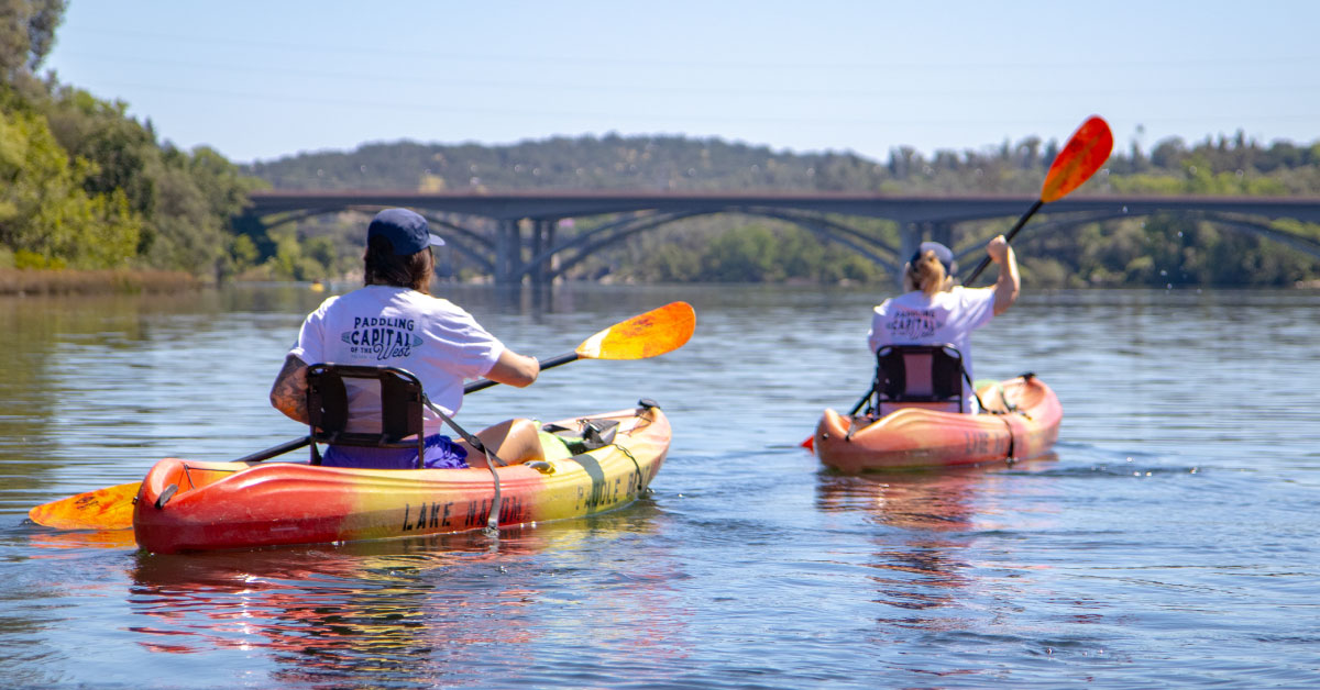 two girls kayaking