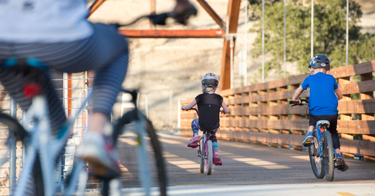 kids cycling on johnny cash trail