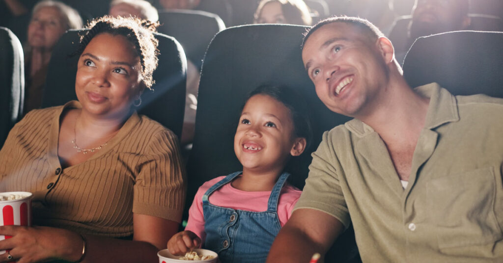 family at movie theater