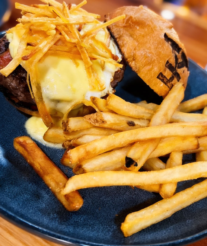 Burger with egg and hashbrowns